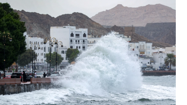 High waves break on the Mutrah seaside in Oman 