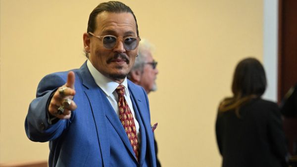 The woman then held up the baby and claimed Depp was the father