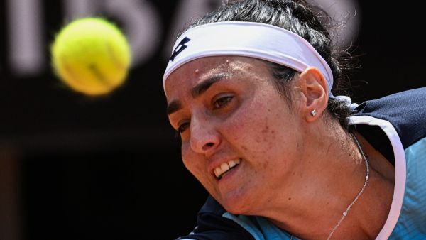 Tunisia's Ons Jabeur returns to Poland's Iga Swiatek during the final of the Women's WTA Rome Open tennis tournament on May 15, 2022 at Foro Italico in Rome. (Photo by Tiziana FABI / AFP)