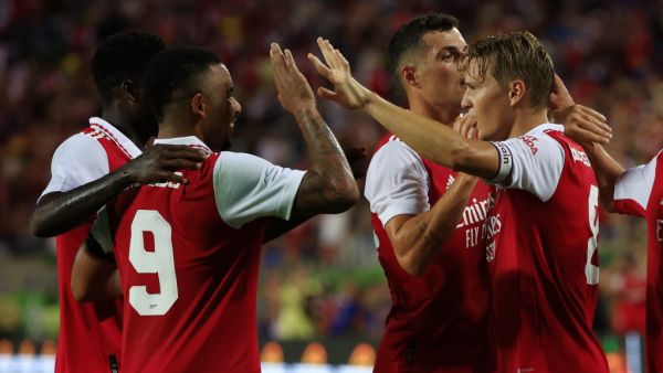 Martin Odegaard of Arsenal celebrates with teammates Gabriel Jesus and Granit Xhaka after scoring their side's second goal during the Florida Cup match between Chelsea and Arsenal at Camping World Stadium on July 23, 2022 in Orlando, Florida. Mike Ehrmann/Getty Images/AFP (Photo by Mike Ehrmann / GETTY IMAGES NORTH AMERICA / Getty Images via AFP)