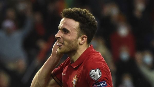 Portugal's forward Diogo Jota celebrates after scoring a goal during the World Cup 2022 qualifying semi-final first leg football match between Portugal and Turkey at the Dragao stadium in Porto on March 24, 2022. (Photo by MIGUEL RIOPA / AFP)