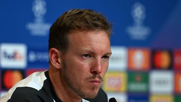 (Photo by Christof STACHE / AFP) يوليان ناغلسمان (المصدر: أ ف ب)