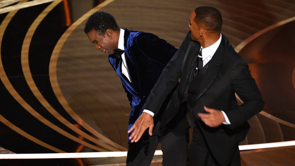 Will walked up to the stage and slapped the comedian across his face. 
