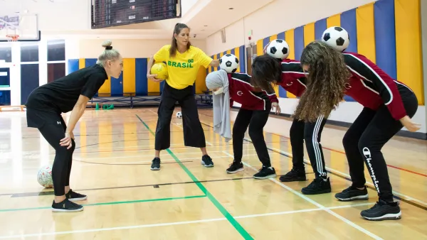 QF Students Learn To Express Themselves – Using a Football