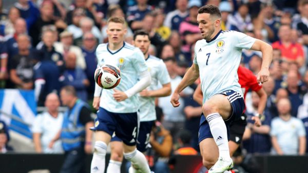 Scotland's midfielder John McGinn (R) controls the ball during the UEFA Nations League, league B group 1 football match between Republic of Ireland and Scotland at Aviva stadium in Dublin, Ireland on June 11, 2022. (Photo by Paul Faith / AFP)