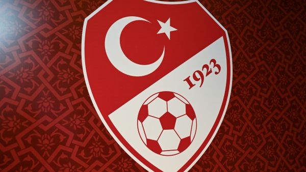 This picture taken on September 20, 2021 in Istanbul shows a logo of Turkish Football Federation (TFF) on a wall of its headquarters. (Photo by Ozan KOSE / AFP)