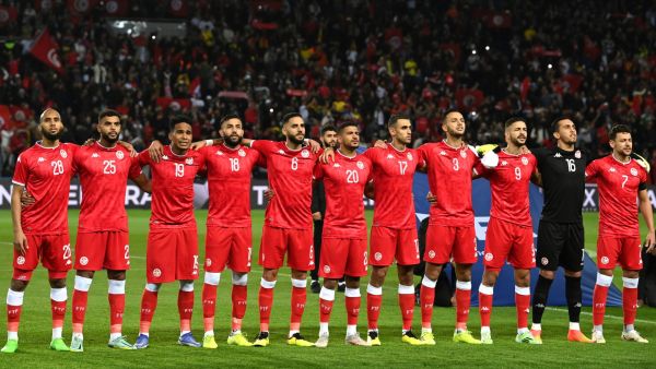 Tunisia's players listen to the national anthems prior to the friendly football match between Brazil and Tunisia at the Parc des Princes in Paris on September 27, 2022. (Photo by FRANCK FIFE  AFP)