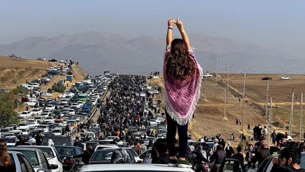 Woman in Iran protests 