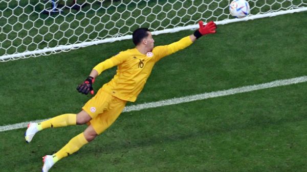 Tunisia's goalkeeper #16 Aymen Dahmen concedes a goal from a shot by Australia's forward #15 Mitchell Duke (not seen) during the Qatar 2022 World Cup Group D football match between Tunisia and Australia at the Al-Janoub Stadium in Al-Wakrah, south of Doha on November 26, 2022. (Photo by Antonin THUILLIER / AFP)