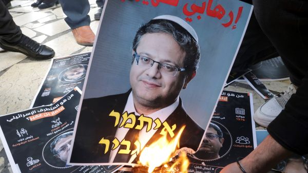 Palestinians burn a portrait of far-right Israeli MP Itamar Ben Gvir