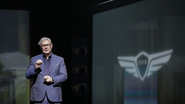 Luc During Speech. Genesis Unveils X Concept Trilogy at Dubai Opera