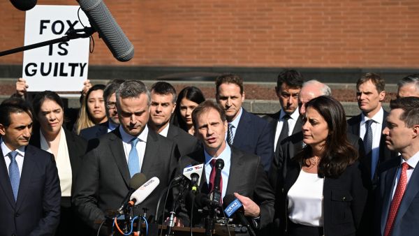 Justin Nelson, joined by fellow members of the Dominion Voting Systems legal team, speaks to members of the media outside the Leonard Williams Justice Center in Wilmington, Delaware, on April 18, 2023. Vote machine maker Dominion and Fox News settled a defamation case over falsehoods about the 2020 presidential election aired on the conservative TV network, a US judge announced Tuesday. (Photo by ANDREW CABALLERO-REYNOLDS / AFP)