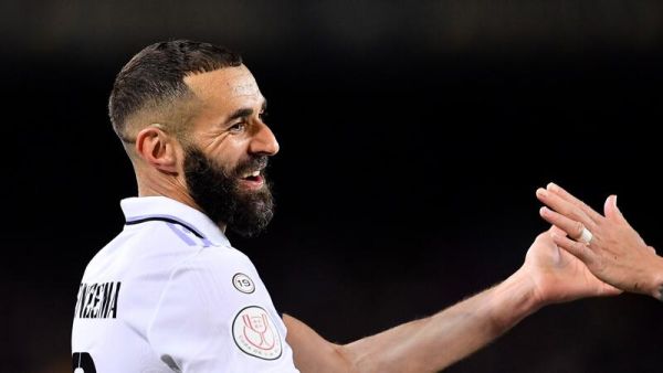 كريم بنزيمة (Photo by Pau BARRENA / AFP)