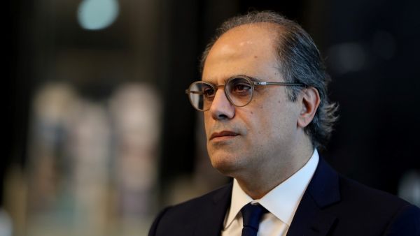 Jihad Azour, International Monetary Fund (IMF) Middle East and Central Asia director, speaks during an interview with AFP at Dubai's International Financial Center on April 28, 2019. (Photo by KARIM SAHIB / AFP) Jihad Azour