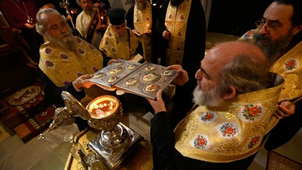 A handout picture taken and released on March 3, 2023 by Patriarchate of Jerusalem and Buckingham Palace shows oils from the Mount of Olives being mixed with essential oils and blessed in Jerusalem to become Chrism Oil, which will be used in the Coronation of King Charles III. (Photo by POOL / AFP) King Charles III