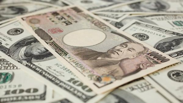 Dollar hovers near two-month high as investors seek safe haven