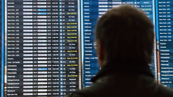 President Biden announces new law requiring US airlines to compensate passengers for flight delays or cancellations