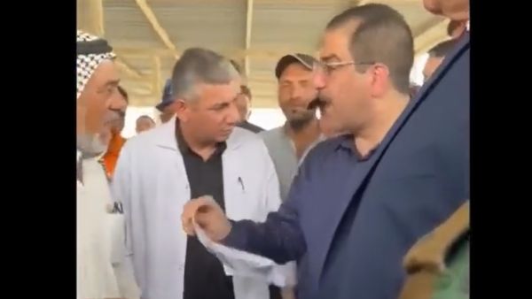 مشادة بين وزير التجارة ومواطن عراقي