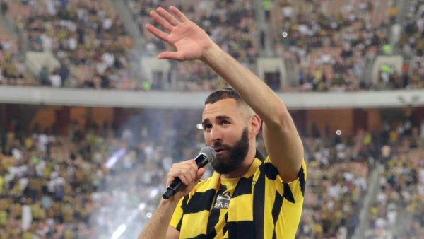 French forward Karim Benzema greets the crowd during his unveiling at King Abdullah Sports City stadium in Jeddah, on June 8, 2023. Benzema was unveiled as an Al-Ittihad player in front of thousands of fans in Saudi Arabia on June 8, a day after the oil-rich kingdom just failed to reel in Lionel Messi. (Photo by AFP)
