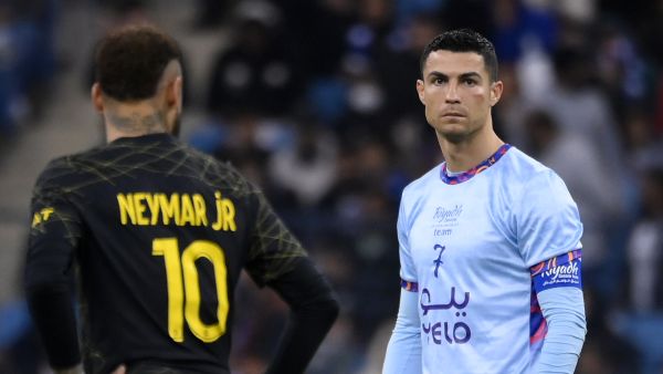 Paris Saint-Germain's Brazilian forward Neymar (L) and Riyadh All-Star's Portuguese forward Cristiano Ronaldo look on during the Riyadh Season Cup football match between the Riyadh All-Stars and Paris Saint-Germain at the King Fahd Stadium in Riyadh on January 19, 2023. (Photo by FRANCK FIFE / AFP)