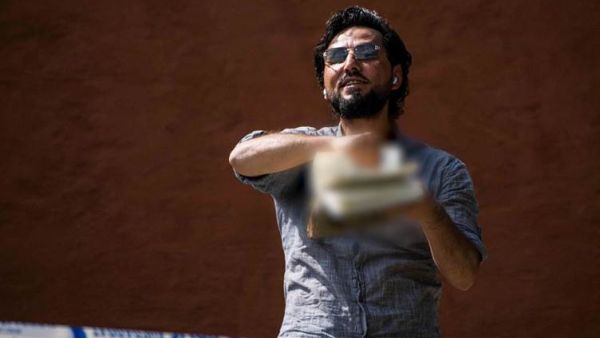 سلوان موميكا، لاجئ عراقي يعيش في السويد