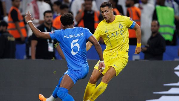 رونالدو والبليهي خلال المباراة (Photo by AFP)