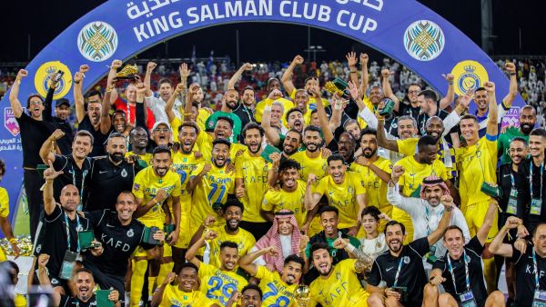 Nassr's players celebrate winning the 2023 Arab Club Champions Cup after their final football match between Saudi Arabia's Al-Hilal and Al-Nassr at the King Fahd Stadium in Taif on August 12, 2023. (Photo by AFP)