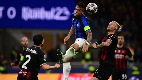 (From L) AC Milan's Italian defender Davide Calabria, Inter Milan's Argentinian forward Lautaro Martinez and AC Milan's Danish defender Simon Kjaer go for the ball during the UEFA Champions League semi-final first leg football match between AC Milan and Inter Milan, on May 10, 2023 at the San Siro stadium in Milan. (Photo by Marco BERTORELLO / AFP)
