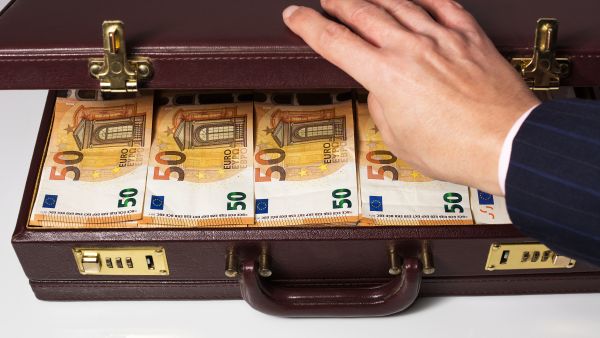 24-hour half-open briefcase full of euro banknotes