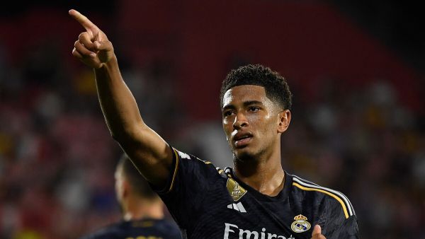 Real Madrid's English midfielder #5 Jude Bellingham celebrates after scoring his team's third goal during the Spanish Liga football match between Girona FC and Real Madrid CF at the Montilivi stadium in Girona on September 30, 2023. (Photo by Josep LAGO / AFP)