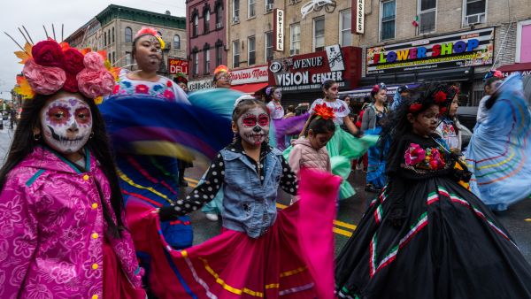Día de los Muertos honors departed loved ones with altars adorned to guide and honor returning spirits. (Adam Gray/ AFP)