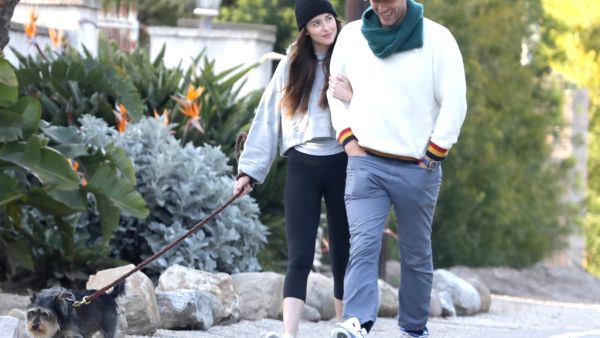 Dakota Johnson shares how Chris Martin supports her during her struggles. (RMBI/ Backgrid)