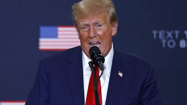 Former US President and 2024 presidential hopeful Donald Trump speaks during a campaign event in Waterloo, Iowa, on December 19, 2023. An appeals court in Colorado on December 19, 2023 ruled Donald Trump cannot appear on the state's presidential primary ballot because of his involvement in the attack on the Capitol in January 2021. (Photo by KAMIL KRZACZYNSKI / AFP) Donald Trump