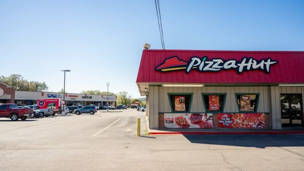Pizza Hut’s delivery driver layoffs sparked outrage over minimum wage hike. (Brandon Bell/ AFP) Pizza Hut’s delivery driver layoffs sparked outrage over minimum wage hike. (Brandon Bell/ AFP)