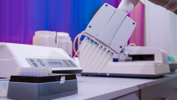 Robotic dispensing machine in modern biochemical laboratory