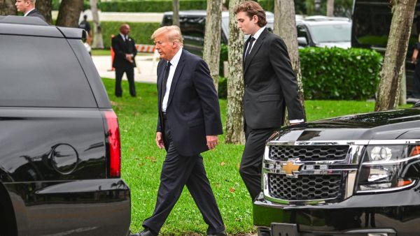 Former US President Donald Trump and his son Barron Trump attend the funeral of former first lady Melania Trump's mother Amalija Knavs, at Bethesda-by-the-Sea Church, in Palm Beach, Florida, on January 18, 2024. (Photo by GIORGIO VIERA / AFP) Barron Trump