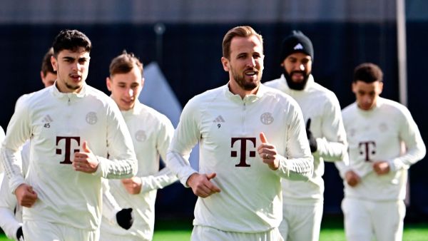 Bayern Munich's English forward #09 Harry Kane (C), Bayern Munich's German-Serbian midfielder #45 Aleksandar Pavlovic (L) and team mates attend a training session of German club FC Bayern Munich in Munich, southern Germany on February 13, 2024, one day ahead of the UEFA Champions League round of 16 first leg football match between S S Lazio and Bayern Munich to be played in Rome. (Photo by Tobias SCHWARZ / AFP)
