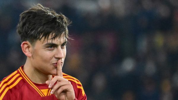 Roma's Argentine forward #21 Paulo Dybala celebrates after scoring a goal during the Italian Serie A football match between AS Roma and Udinese on November 26, 2023 at the Olympic stadium in Rome. (Photo by Alberto PIZZOLI / AFP)