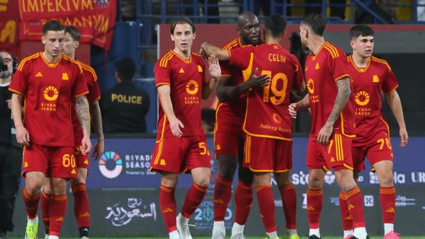 Roma's players celebrate their second goal, during a friendly football match with Saidi's Al-Shabab at Al-Awwal Park in Riyadh, on January 24, 2024. (Photo by Fayez NURELDINE / AFP)
