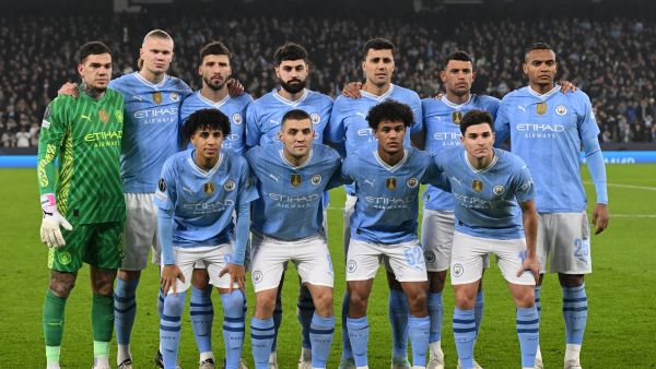 Man City's players pose for a team photo before the UEFA Champions League round of 16, second-leg, football match between Manchester City and FC Copenhagen at the Etihad Stadium, in Manchester, north west England, on March 6, 2024. (Photo by Oli SCARFF / AFP)