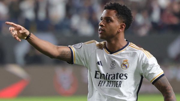 Real Madrid's Brazilian forward #11 Rodrygo celebrates after scoring his team's fourth goal during the Spanish Super Cup final football match between Real Madrid and Barcelona at the Al-Awwal Park Stadium in Riyadh, on January 14, 2024. (Photo by Fayez NURELDINE / AFP)