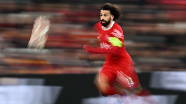 Liverpool's Egyptian striker #11 Mohamed Salah chases the ball during the UEFA Europa League group E football match between Liverpool and Linzer ASK at Anfield in Liverpool, north west England on November 30, 2023. (Photo by Oli SCARFF / AFP)