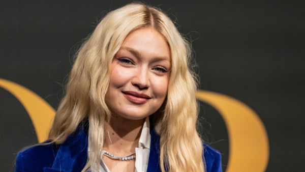Shutterstock Gigi Hadid plants a kiss on Bradley Cooper during PDA-packed date night in NYC