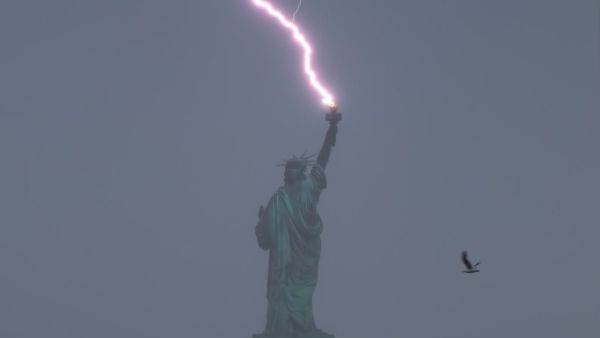  a peculiar lightning strike hitting the Statue of Liberty