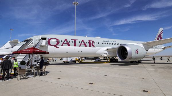 A Qatar Airways Boeing 787-9 jetliner aircraft is pictured on the tarmac (Photo by Giuseppe CACACE / AFP)
