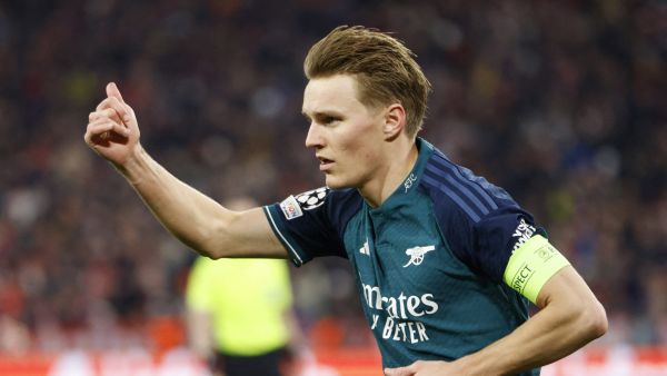 Arsenal's Norwegian midfielder #08 Martin Odegaard reacts during the UEFA Champions League quarter-final second leg football match between FC Bayern Munich and Arsenal FC in Munich, southern Germany on April 17, 2024. (Photo by Michaela STACHE / AFP)