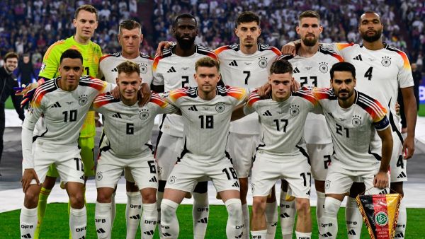 Germany's players pose for a team photograph ahead of kick-off in the UEFA Euro 2024 Group A football match between Germany and Scotland at the Munich Football Arena in Munich on June 14, 2024. (Photo by Tobias SCHWARZ / AFP)