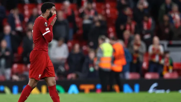 Liverpool's English defender #02 Joe Gomez reacts after the UEFA Europa League quarter-final first leg football match between Liverpool and Atalanta at Anfield in Liverpool, north west England on April 11, 2024. Atalanta won the match 3-0. (Photo by Darren Staples / AFP)