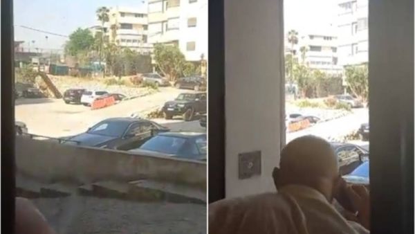 أشخاص يتابعون الحدث بحالة من الذعر والخوف