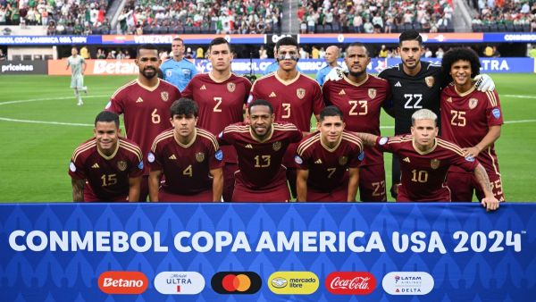 Venezuela players pose for a team photo ahead of the Conmebol 2024 Copa America tournament group B football match between Venezuela and Mexico at SoFi Stadium in Inglewood, California on June 26, 2024. (Photo by Patrick T. Fallon / AFP)